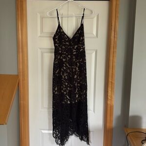 Black lace dress with cream under slip. So sexy on.